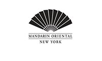 A black and white logo of mandarin oriental new york.