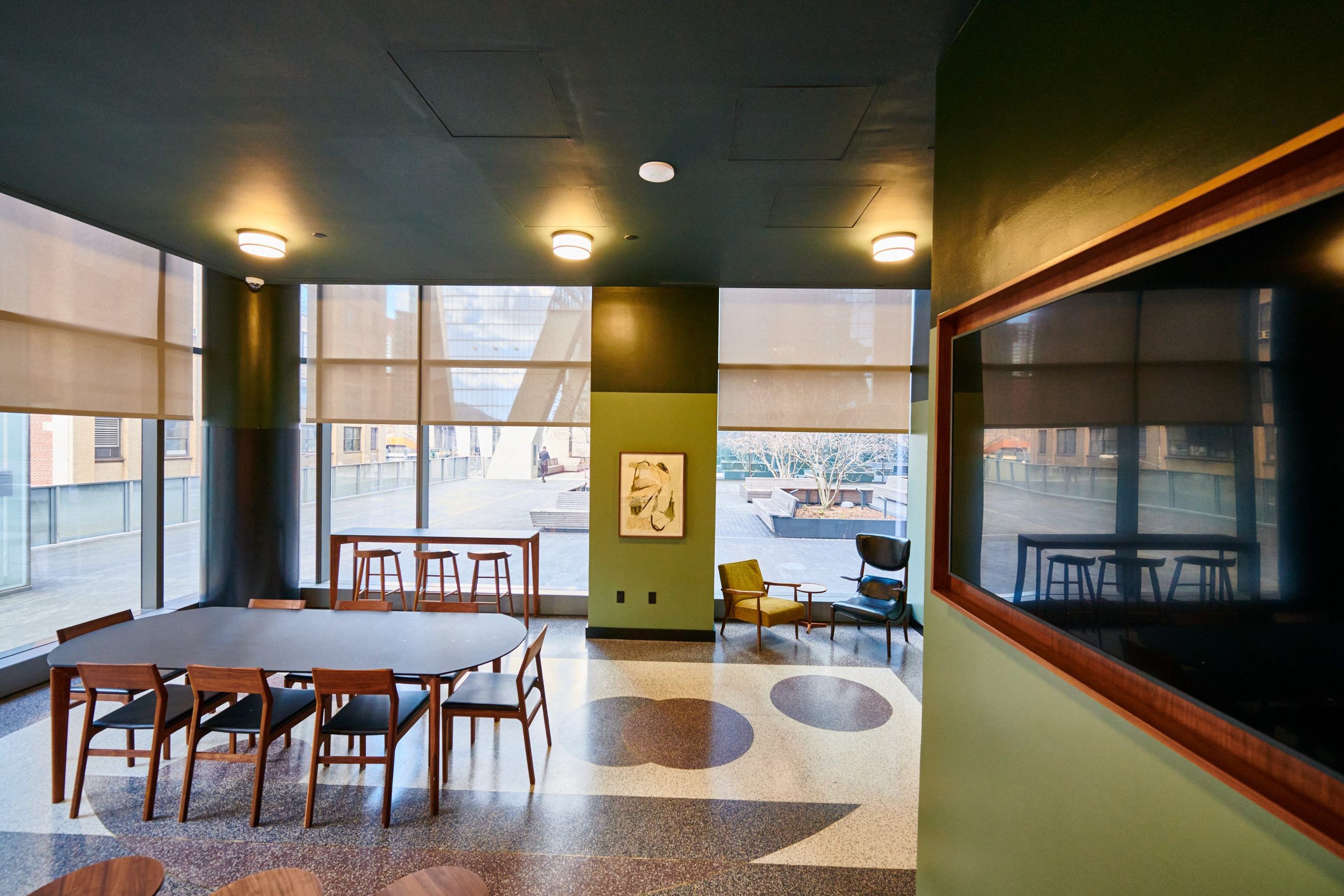 A room with tables and chairs in it