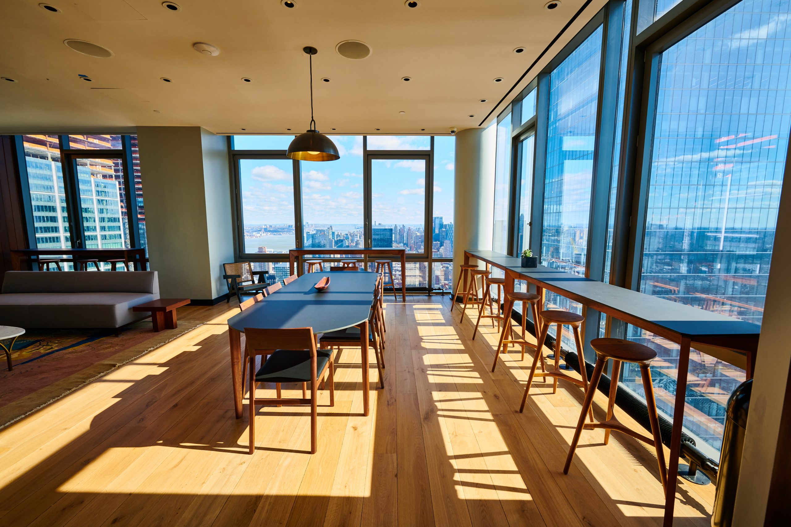 A room with many tables and chairs in it